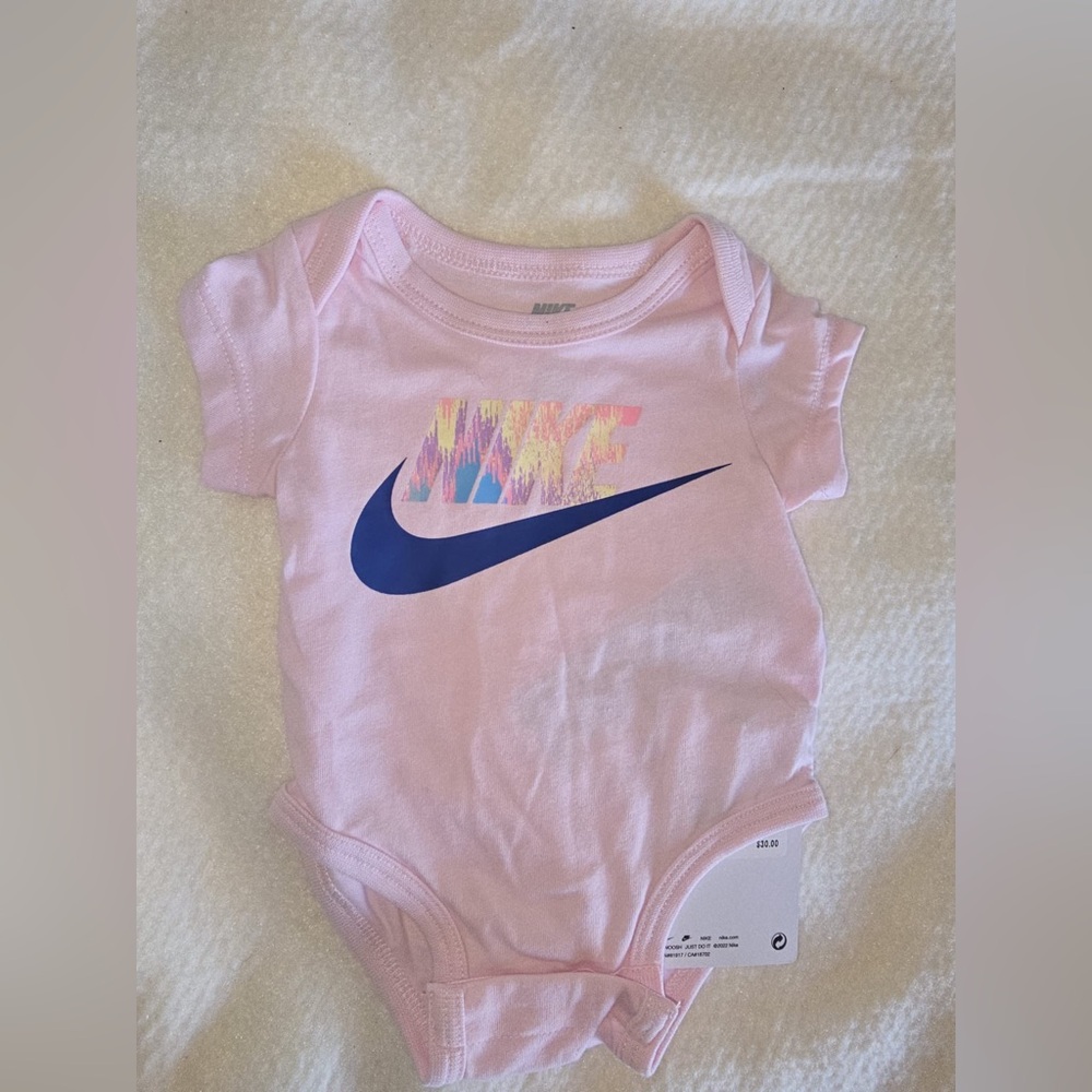 Nike Pink Baby One Piece with Blue Logo